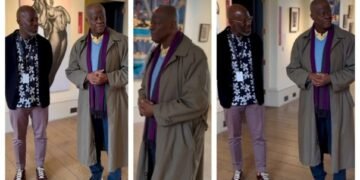 Finance Minister Edun in Good Spirits, Visits Art Gallery Booth in London